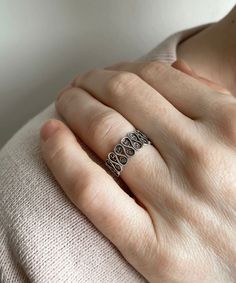 "925 Sterling Silver Filigree Art Band Ring Super Light Handcrafted Perfect Gift Option for Her Band width is 0.31\" / 7.8 mm This metal embroidery filigree ring is oxidized and highly polished. Comes with a velvet pouch, silver polish cloth and a luxurious gift box. The sterling silver is hypoallergenic, nickel, and lead free so it is safe for sensitive skin. Filigree is a unique piece that incorporates handcrafted twisted threads of precious metal into its design. The metal is then soldered to the Silver jewelry and can take the shape of lacy flourishes, beautiful scroll work, symmetrical Art Deco style designs, among other astonishing motifs. It's good to point out that Filigree can also be used to describe any pattern in jewelry that can be seen as delicate and sophisticated. Thank you Metal Embroidery, Filigree Jewelry, Silver Wedding Bands, Eternity Band Ring, Band Jewelry, Sterling Silver Filigree, Mesopotamia, Velvet Pouch, Filigree Ring