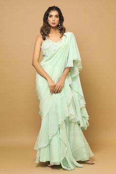 Shop for Ahi Clothing Green Net Ruffle Pre-draped Saree With Blouse for Women Online at Aza Fashions Ruffled Saree, Farewell Saree, Desi Attire, Net Embroidery, Simple Saree Designs, Cotton Saree Blouse Designs, Couple Wedding Dress, Character Wardrobe, Pranali Rathod