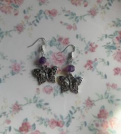 dangle earrings ft amethyst bead and a metal charm