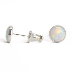 These opal stud earrings are beautiful.  They feature a single 6mm simulated opal cabochons.  Hand bezel set in my studio.  6mm Simulated Opal Round CabochonsSolid 925 Sterling Silver or 14/20 Gold FilledDeluxe Luxlock Backs-Safe, Secure, ComfortableArtisan Made in TexasArrives thoughtfully packaged in a signature jewelry boxCheck out all of my opal earrings: https://www.etsy.com/shop/KMBankston/search?search_query=opal+earring&order=date_desc&view_type=gallery&ref=shop_search~About Elegant Nickel-free Opal Ring For Gift, Classic Opal Cabochon Jewelry, Iridescent Opal Cabochon Jewelry, Minimalist Iridescent Round Jewelry, Elegant Hypoallergenic Opal Jewelry, White Hypoallergenic Opal Jewelry, Ethiopian Opal Birthstone Jewelry, Hypoallergenic White Opal Jewelry, Adjustable Round Opal Jewelry