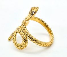 Jennifer Lopez JLo yellow gold plated CZ cubic zirconia snake ring. Good used condition with little to no signs of normal wear. Stamped on the inside of the ring JLRY 925 52. Yellow gold plated setting with small clear CZ eyes. Acid tests positive for sterling silver. Ring measures size 8. Gold Snake-shaped Diamond Ring, Gold Diamond Snake Ring Fine Jewelry, Gold Snake-shaped Diamond Ring For Anniversary, Snake Ring, Plate Sets, Jennifer Lopez, Silver Ring, Cubic Zirconia, Gold Plate