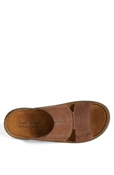 Premium leather forms an earthy sandal built with a padded footbed for day-long comfort. Leather upper/leather and textile lining/rubber sole. By Josef Seibel; imported. Men's Shoes. Slip-on Open Toe Sandals With Stitched Sole, Cushioned Open Toe Brown Sport Sandals, Brown Cushioned Open-toe Sport Sandals, Brown Cushioned Open Toe Sport Sandals, Leather Slip-on Sandals With Removable Insole, Brown Cushioned Round Toe Sport Sandals, Leather Mules With Removable Insole, Slip-on Slides With Leather Sole And Round Toe, Leather Footbed Slip-on Slides