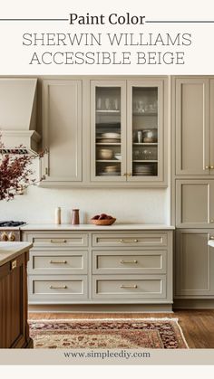 an image of a kitchen with white cabinets and wood floors in the color sherwin williams's accessible beige