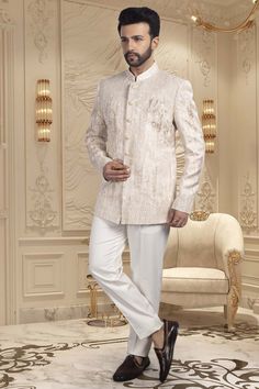 Indulge in the exquisite luxury of our Mens Bandhgala M42-S79, adorned with beautiful Cutdana and sequence detailing. Experience the sophistication and exclusivity of our premium product, designed to elevate your style and make a statement. Elevate your wardrobe with this tasteful piece. Bollywood Style Cream Bandhgala With Cutdana, Luxury White Embroidered Bandhgala, Festive Cream Bandhgala With Cutdana Detail, Mens Bandhgala, Fitted Off-white Bandhgala With Cutdana, Luxury Semi-stitched White Bandhgala, Premium Product, Elevate Your Style, Your Style