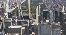 an aerial view of the city with skyscrapers and other tall buildings in the foreground