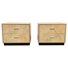 two wooden drawers sitting next to each other