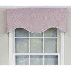 a window with a pink and white valance