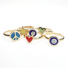 Indulge in the exquisite craftsmanship of our Gold Enamel Evil Eye Ring. Handmade with gold, this stunning ring features an enamel evil eye, adding a touch of color and protection to any outfit. Perfect for expressing your passion and unique style. Specifications Evil Eye Dimensions 8x9mm Material 14k Yellow Gold Enamel Vitreous - Cobalt Blue and Sky Blue Peace Sign Ring, Elizabeth Stone, Evil Eye Ring, Diamond Charm, Bar Bracelets, Eye Ring, Star Ring, Gold Enamel, Silver Enamel