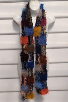 Scarf is handknitted in patchwork style and OOAK Combines many different yarns and textures Is 180cm long and 12cm wide Is multi colored and textured Thick and warm Care is handwash and dry flat, no iron Handmade Multicolor Winter Scarves, Cozy Multicolor One Size Scarves, Multicolor Yarn Scarves For Winter, One Size Multicolor Yarn Scarves, Handmade Multicolor Infinity Scarf One Size, Bohemian Wool Scarves Handmade, Handmade Wool Scarves In Bohemian Style, Handmade Yarn Scarves One Size, Bohemian Handmade Wool Scarves