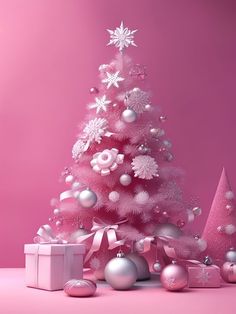 a pink christmas tree surrounded by presents