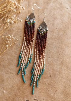 Bohemian Beaded Earrings With Natural Stones, Bohemian Teardrop Beaded Earrings With Natural Stones, Artisan Turquoise Beaded Earrings, Bohemian Brown Beaded Earrings With Dangling Beads, Southwestern Style Brown Beaded Earrings For Gift, Southwestern Style Brown Jewelry With Colorful Beads, Southwestern Brown Beaded Earrings As Gift, Earthy Brown Earrings For Festivals, Southwestern Style Brown Beaded Jewelry