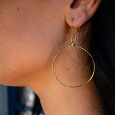 You won’t want to take these hoop earrings off - they are effortless, light and comfortable to wear all day and into the evening. These handmade earrings are perfect for everyday wear. This item is part of the “Hope Line” which consists of introductory pieces made by our new artisans, and tell a powerful story of fresh beginnings. The artisans first learn how to wrap while making these earrings! Included with your purchase of the brass Olivia Earrings will be a polishing cloth and instructions o Everyday Hypoallergenic Hoop Wrap Earrings, Nickel Free Circular Earrings, Metal Open Circle Hoop Earrings, Everyday Metal Hoop Wrap Earrings, Hoop Wrap Earrings For Gift, Hoop Jewelry With Lever Back Ear Wires For Everyday, Minimalist Hoop Earrings With Lever Back Ear Wires, Everyday Hoop Earrings With Lever Back Ear Wires, Simple Hypoallergenic Dangle Hoop Earrings