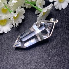 Name :12-6-24 sided Vogel Style quartz Natural Clear Quartz Crystal sterling silver pendant DT Wand POINT healing Material : natural clear quartz crystal Weight :20-25g approx Size :46-53mm *17-23mm*13-16mm approx  attention      All of our crystals & stones are natural and have formed over millions of years. They are not reconstituted nor lab-grown.Because they are natural, each piece may have inclusions, natural lines or indentations.This is normal and part of the natural material.      These Silver Faceted Crystal Necklaces For Healing, Silver Faceted Crystal Necklace For Healing, Faceted Silver Crystal Necklace For Spiritual Use, Spiritual Silver Quartz Crystals, Silver Quartz Crystals For Gifts, Spiritual Silver Quartz Crystal Necklaces, Spiritual Silver Quartz Crystal Necklace, Silver Quartz Crystal Necklaces For Spiritual Style, Spiritual Silver Mineral Crystal