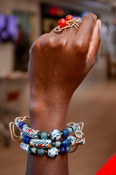 How fun is it to have hand-painted authentic beads!This chic Blue bracelet is a blend of beautiful Segi and Gas beads from West Africa. It beautifully fills out your wrist being almost 2 inches wide and 7.5 inches long. We add extra links to allow you to adjust it. Step out in style with our handmade layered Blue beaded Bracelet! Thank you for visiting our store! Xoxoxo Atiamuga Blue Wrap Bracelet With Colorful Beads For Gifts, Blue Wrap Bracelet With Colorful Beads As Gift, Adjustable Blue Beaded Bracelets With Wooden Beads, Bohemian Blue Stretch Bracelet With Large Beads, Blue Hand-strung Multi-strand Bracelet, Blue Multi-strand Hand-strung Bracelet, Blue Wooden Beaded Bracelets For Beach, Adjustable Blue Artisan Beaded Bracelets, Adjustable Artisan Blue Beaded Bracelets