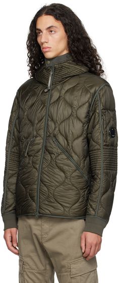 Primaloft®-insulated quilted nylon ripstop jacket. Webbing trim throughout. · Rib knit trim and press-stud fastening at hood · Two-way zip closure · Zip pockets · Zip pocket and acetate lens at sleeve · Flap pocket at interior · Fully lined Supplier color: Grape leaf Liner Jacket, Grape Leaf, C P Company, Mens Outerwear, Grape Leaves, Press Studs, Flap Pocket, Outerwear Jackets, Apparel Accessories