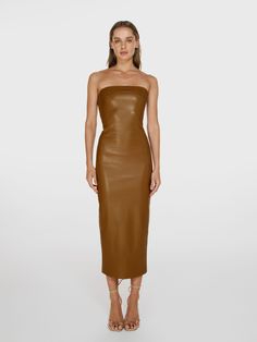 Full shot of a girl in a brown vegan leather tube dress Midi Dress Brown, Miranda Priestly, Leather Midi Dress, Slouchy Pants, Slow Fashion Brands, Leather Design, Slow Fashion, Strapless Dress Formal, Jumpsuit Dress