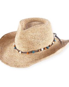 Woven from naturally breathable raffia, the bestselling Goldie has an extra-wide brim for full sun protection whether you wear it flat or fold it up cowgirl style. We threaded colorful beads around the hatband of this women's hat, then added a soft interior band for a comfy, just-right fit. Cowgirl silhouette with a full brim for sun protection Adjustable brim can be worn flat or cowgirl-style; Beaded hatband cord Soft interior band for comfort Raffia Brim length: 9 cm / 3.5" One size; Women's-s Cowgirl Silhouette, Bead Hat, Beaded Hat, Cowgirl Hats, Cowgirl Style, Hat Band, Wide Brimmed, Sun Hats, Sun Protection