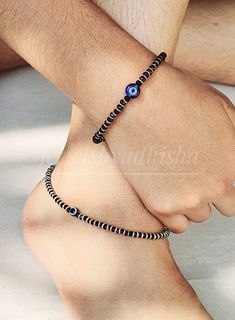 Evil Eye Black Onyx Beaded Silver Anklet /Bracelet Evil Eye Black Onyx Anklet &Hand Bracelet-925 Sterling Silver-Black Silver Beaded hand bracelet &Anklet-Adjustable Feet/Hand bracelet-Unisex Anklet-Black Onyx jewelry Anklet-10inch ------------------- bracelet-7.5inch Why To Wear Silver As a metal, silver has significant health benefits that have been used across cultures for centuries. Silver has a proven track record as a powerful antimicrobial agent fighting infections and aiding in cold and flu prevention, wound healing, and more. Silver also helps with internal heat regulation and circulation. About gemstone- Black Onyx is the birthstone for Leo. It is the stone of protection. This elegant smooth textured stone is said to have immense healing and spiritual benefits. Black Onyx symboli Adjustable Black Bracelet With Silver Beads, Silver Adjustable Spiritual Anklets, Handmade Adjustable Black Anklet, Black Anklets With Round Beads For Gift, Black Adjustable Evil Eye Bracelet, Black Onyx Jewelry, Silver Anklet, Onyx Jewelry, Hand Bracelet