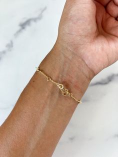 Simple and dainty - this Lightning bolt bracelet is a perfect minimal piece you can wear every day! Made from 925 Sterling Silver and detailed with mini bolts for a touch of fun. This bracelet is finished with a lobster clasp closure and offers three different rings for length closures. Adjustable Minimalist 14k Gold Filled Charm Bracelet, Adjustable 14k Gold Filled Minimalist Charm Bracelet, Minimalist Adjustable Sterling Silver Bracelet With Lobster Clasp, Adjustable Minimalist 14k Gold-filled Charm Bracelet, Adjustable Delicate Heart Bracelet For Everyday, Delicate Adjustable Heart Bracelet For Everyday, Dainty Hypoallergenic Name Bracelet, Adjustable Dainty Sterling Silver Bracelet For Everyday, Minimalist Everyday Chain Bracelet With Spring Ring Clasp