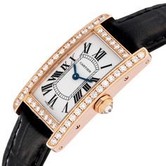 Cartier Tank Americaine Small Rose Gold Diamond Ladies Watch WJTA0002. Quartz movement. 18K Rose gold case 19.0 x 28.0 mm. Octagonal crown set with an original Cartier factory diamond. Original Cartier factory diamond bezel. Scratch resistant sapphire crystal. Silver opaline dial with Roman numerals. Sword shaped blued steel hands. Black leather strap with 18K rose gold deployant clasp. Luxury Yellow Gold Diamond Watch With Brilliant Cut, Yellow Gold Diamond Watch For Anniversary, Luxury Cartier Diamond Watch For Anniversary, Cartier Jewelry With Round Dial For Evening, Luxury Diamond Watch With Round Dial For Anniversary, Luxury Yellow Gold Diamond Watch For Wedding, Cartier Diamond Watch With Diamond Hour Markers For Anniversary, Luxury Watches With Brilliant Cut For Anniversary, Luxury Diamond Watch With Rectangular Dial For Formal Occasions