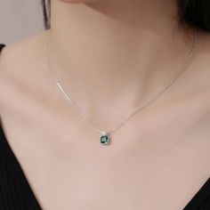 This exquisite pendant necklace showcases a brilliant emerald in a classic solitaire setting, radiating a lush green hue. Its elegant simplicity makes it a standout piece, perfect for enhancing any neckline with a touch of refined sophistication. Solitaire Setting, Solitaire Pendant Necklace, Zambian Emerald, Emerald Pendant, Diamond Education, Solitaire Pendant, Lush Green, Jewelry Care, Ring Shopping