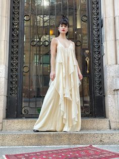 70s silk Cream color chiffon layers on both front and back, absolutely fabulous gown Grecian style with butterfly print, silk tie on shoulder can be adjust Made in England. Bust 15" Length 59" Waist open. good vintage condition.  Etsy Shipping Please read -Vintage and pre-owned items may have signs of wear and use and are offered as is. Traces of age and use are therefore completely normal and do not constitute defects. Please see pictures as they are part of the item description and refer to sizes/measurements provided. measurements are taken Flat, double for circumference. Please contact me if you want more information and/or pictures.  All sales are final.  -I do NOT offer cancellation, redemption or exchange. -Combined shipping with other articles is possible; please contact me for an 70s Gown, Grecian Style, Beige Dress, Edgy Hair, Silk Gown, Whimsical Fashion, Beige Dresses, Absolutely Fabulous, Sheer Dress