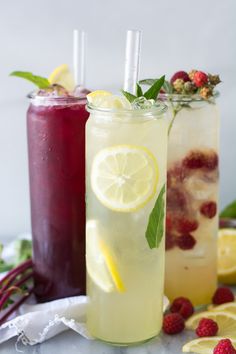 two glasses filled with lemonade and raspberry iced tea