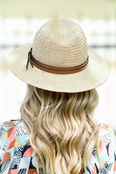 NON-ELIGIBLE FOR RETURN. FINAL SALE Channel your inner cowgirl with our Western Dreamer Panama Hat. Designed with rustic charm and western flair, this wide brim hat is perfect for western country concerts, a day on the ranch, or a sunny resort vacation, offering both style and sun protection. Handmade Woven Crisscross Pattern Style: Western Panama Hat Vegan Leather Band Accent 100% Paper Circumference: 22.25" Brim: 2.75" Crown height: 4.75" One size fits most Adjustable Country Fedora For Kentucky Derby, Country Style Straw Fedora Hat, Cream Straw Hat With Curved Brim For Country Events, Adjustable Rustic Fedora Sun Hat, Natural Hat Band With Flat Brim For Country Events, Adjustable Wide Brim Straw Hat For Fall, Adjustable Wide Brim Rustic Fedora, Curved Brim Fedora For Beach In Fall, Curved Brim Fedora For Beach And Fall