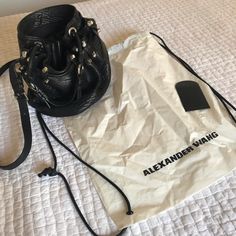 100% Authentic Alexander Wang Diego Bucket Bag In Great Condition! Used A Couple Of Times And Stored Nicely In Its Protective Bag. Leather Has No Tears And Hardware Still Shines. Minor Scratches To The Bottom Hardware But Hardly Noticed. Black Pebbled Leather, Silver Hardware. Crossbody Strap And Drop Handle For Multi Functional Wear Serious Buyers Leave Comments! Purchased From The Alexander Wang Store In Soho, Ny. Designer Bucket Bag For Daily Use, Designer Shoulder Bucket Bag, Designer Bucket Bag With Branded Hardware, Designer Satchel Bucket Bag With Branded Hardware, Designer Crossbody Bucket Bag For Shopping, Designer Satchel Bucket Bag, Designer Bucket Bag With Removable Pouch, Designer Travel Bucket Bag With Branded Hardware, Designer Black Bucket Bag With Double Handle