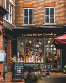 the london review bookshop is located in an old brick building with lots of windows