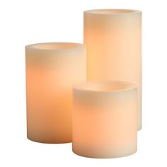 Our realistic ivory flameless LED pillar candle creates a cozy, heat-free ambiance that's safe for homes with children or pets. This battery-operated candle includes a five-hour timer that automatically turns it on and off at the same time every day, making the candle ideal for hard-to-reach sconces. Modern Natural Decor, Huge Candles, Realistic Candles, Holly House, Led Pillar Candle, Tabletop Accessories, Small Candles, Tabletop Decor, Seasonal Home Decor