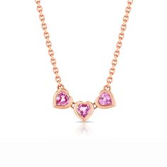 Design Set in a handmade bezel, this necklace features three connected heart-shaped pink sapphires on beautiful chain. Details & Dimensions - 0.75 carats- Adjustable 15" - 16" chain Heart Stone Necklace, Heart Necklace Diamond, Bezel Pendant, Fine Jewelry Designers, Stone Heart, Pendant Design, Design Set, Diamond Heart, Pink Sapphire