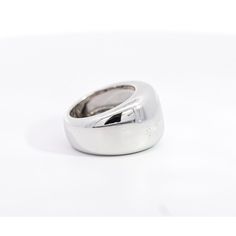 Vintage Cartier Nouvelle Vague Ring, set in 18K White Gold.   This unisex dome ring showcases a remarkable display of gleaming silver/white hues. An authentic vintage creation from Cartier, it embodies the brand's rich legacy of quality and craftsmanship. Made in 1997.  Item Details: - Type: Vintage  - Cartier Nouvelle Ring  - Serial No.: H16257** - Date: 1997 - Metal: 18K White Gold  - Weight: 14.3 Grams  - Size: 5  - Measurements: 13.5 MM   _______________________________  Please refer to the Timeless White Gold Thick Band Ring, Luxury Silver Engraved Ring For Formal Occasion, Timeless White Gold Dome Ring In Sterling Silver, Timeless Domed Signet Ring With Polished Finish, Timeless White Gold Sterling Silver Dome Ring, Modern White Gold Dome Ring As Gift, Luxury Platinum Signet Ring, Luxury Platinum Signet Ring For Formal Occasion, Luxury Silver Signet Ring For Formal Occasions