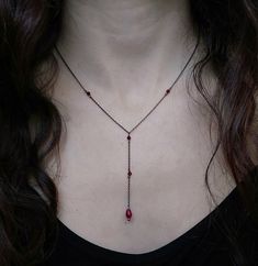 Artemis Dreaming. Βeauty and magic in the most delicately dark way. This necklace is composed of black rhodium over 925 sterling silver delicate sparkling chain, four burgundy garnet gemstones and a tiny burgundy agate drop. You can choose between these chain lengths: 15 / 16 / 17 / 18 inches Not sure which length to buy? We can add a 1 inch extender chain. Just write a note at checkout! ❈ We send all our items with registered mail. ❉ Due to the organic nature of stones, there might be a slight variation in colour, size and shape. ✺ All items come packaged in a quality velvet pouch ready for gift giving. ✽ If you want to make a special order, just contact us! Dainty Gothic Jewelry, Artemis Dreaming, Purple Goth, Organic Nature, Y Necklace, Velvet Pouch, Seed Bead Bracelets, Black Rhodium, Bracelet Crafts