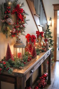 christmas decorations on a console table in a hallway