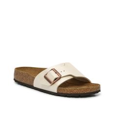 Birkenstock-Catalina Sandal - Women's Slip on the casual Catalina sandals from Birkenstock to complete your summer wardrobe. This pair features a classic slide silhouette, complete with a large strap and a contoured footbed for comfort and support. Classic Summer Slippers With Round Toe, Classic Round Toe Slippers For Summer, Classic Summer Slippers With Textured Footbed, Classic Slides For Summer Vacation, Classic Round Toe Summer Slippers, Classic Summer Slides For Vacation, Classic Summer Footbed Sandals For Vacation, Classic Footbed Sandals For Summer Vacation, Beige Footbed Sandals With Buckle Closure For Spring