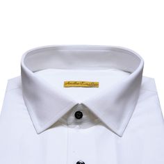 At André Emilio, we believe that every wardrobe should include a classic staple that transcends trends and showcases effortless style. Presenting the Bespoke Oxford White Shirt, a true icon of timeless elegance and unmatched versatility. Handcrafted with meticulous attention to detail, this shirt embodies the finest traditions of tailored craftsmanship. We have carefully selected premium oxford fabric renowned for its exceptional quality, durability, and luxurious feel against the skin. The cris White Long Sleeve Luxury Dress Shirt, Luxury White Long Sleeve Dress Shirt, Classic Semi-formal Tops With Concealed Placket, Luxury White Cotton Dress Shirt, Classic Tops With Concealed Placket And Spread Collar, Luxury White Shirt With Fold Down Collar, Timeless White Shirt With Fold Down Collar, Luxury White Shirt With Concealed Placket, Classic Formal Cotton Tops