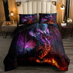 a bed covered in a purple and black dragon comforter next to a night light