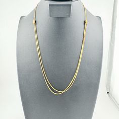 Add a touch of quiet luxury to your summer wardrobe with this enchanting vintage necklace. This minimalist piece features a delicate gold chain, perfect for adding a touch of sophisticated elegance to any outfit. The necklace lays beautifully on the collarbone, making it a versatile piece that can be dressed up or down. Whether you're a fan of vintage style or simply love minimalist jewelry, this necklace is a must-have. Size: 8.75 inch drop, Adjustable Slide *Condition: Some minor finish wear as shown in photos. Previously owned and in great condition, making it a valuable find for any collector. ~ Thank you for supporting my Latina | Female | Air Force Veteran owned small business. Please check out the other vintage jewelry items in my shop to fill your soul. Offers Always Welcome #layer Minimalist Snake Chain Layered Necklace, Classic Gold Layered Necklace With Clavicle Chain, Elegant Gold Long Charm Necklace, Minimalist Clavicle Chain Necklace For Formal Occasions, Minimalist Formal Clavicle Chain Necklace, Chic Gold Long Necklace For Gift, Gold-tone Long Minimalist Chain Necklace, Minimalist Double Strand Clavicle Chain Necklaces, Classic Double Strand Gold Necklace