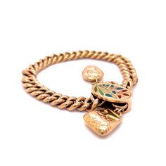 This unique and captivating Victorian-era bracelet is crafted in 14 karat yellow gold. Featuring a charmingly detailed enamel floral charm, this adjustable bracelet is the perfect accessory for any outfit. With an antique and vintage look, this classic Russian-style bracelet brings a timeless elegance to any ensemble. Whether you're searching for a gift for a special someone or just looking to add a little something extra to your own look, this lovely bracelet is sure to bring a touch of vintage Luxury Classic Charm Bracelet With Polished Finish, Luxury Gold Antique-style Charm Bracelet, Luxury Vintage Engraved Charm Bracelet, Era Bracelet, Russian Style, Gold Link Bracelet, Metal Shop, Russian Fashion, Enamel Charms