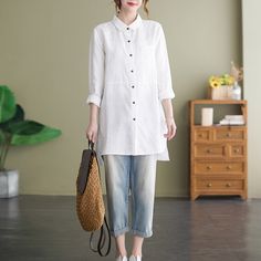 Enjoy the warmer weather in our Long Sleeve Linen Collared Blouse. This relaxed linen button down is lightweight and loose, making it the perfect piece for sunny days when you still want to feel dressed up. Wear tucked into jeans or light trousers for a casual yet put-together look. Casual Long Sleeve Blouse For Spring, Spring Long Sleeve Blouse For Casual Gatherings, Casual Long Sleeve Blouse With Cuffed Sleeves, Casual Solid Blouse With Cuffed Sleeves, Spring Casual Buttoned Blouse, Casual Cotton Blouse With Pockets, Spring Casual Button Blouse, Spring Casual Blouse With Buttons, Cotton Blouse With Pockets For Casual Gatherings