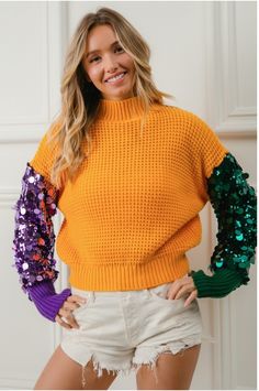 Mardi Gras sequin sleeve top . This sequin patch top will have you so cute for all of the parades y’all!  Oversized fit  💜💚 💛THIS PREORDER SHIPS MID December    📌  𝗧𝗛𝗘𝗥𝗘  𝗔𝗥𝗘  𝗡𝗢  𝗖𝗔𝗡𝗖𝗘𝗟𝗟𝗔𝗧𝗜𝗢𝗡𝗦   𝗢���𝗡   𝗣𝗥𝗘𝗢𝗥𝗗𝗘𝗥  𝗜𝗧𝗘𝗠𝗦 ! 𝗪𝗲  𝗽𝘂𝗿𝗰𝗵𝗮𝘀𝗲  𝘁𝗵𝗲𝘀𝗲   𝗶𝘁𝗲m𝘀  𝗳𝗿𝗼𝗺  𝗼𝘂𝗿  𝗩𝗲𝗻𝗱𝗼𝗿  𝘄𝗵𝗲𝗻  𝘆𝗼𝘂𝗿   𝗼𝗿𝗱𝗲𝗿  𝗶𝘀   𝗽𝗹𝗮𝗰𝗲𝗱 . Mardi Gras Dress, Bride Birthday, Patch Top, Mardi Gras Parade, Sequin Patch, Sequin Sleeve, Sweater Hat, New Years Dress, Color Block Sweater