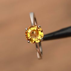 It is a natural citrine ring, octagon cut, measures 7mm*7mm, weight about 1.46 cts. The basic metal is sterling silver and plated with rhodium.To change the metal to a solid gold (white/rose) or platinum is also available, please ask for a quotation if you want.You can also go to my shop Home for more elegant rings: https://www.etsy.com/shop/godjewelry?ref=hdr_shop_menuMore citrine rings:https://www.etsy.com/shop/godjewelry?ref=seller-platform-mcnav&search_query=citrineCustomization is alway Gold Sterling Silver Octagon Rings, Yellow Octagon Ring For Anniversary, Faceted Citrine Promise Ring Jewelry, Gold Octagon Sterling Silver Ring, Yellow Octagon Anniversary Ring, Octagon Citrine Jewelry For Anniversary, Octagon Shaped Sterling Silver Topaz Ring, Octagon Shaped Citrine Jewelry For Anniversary, Yellow Citrine Solitaire Birthstone Ring