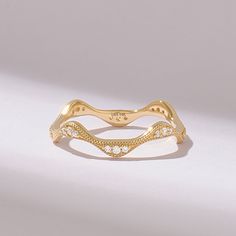 Indulge in elegance with the Diamond Pave Eternity Wave Ring. Crafted from 14k Solid Gold, this milgrain wedding ring boasts a minimalist yet refined design, perfect for stacking or wearing alone. Its delicate wavy shape is adorned with pave diamonds, adding a touch of sparkle and sophistication to any ensemble. Whether as a stackable ring enhancer or a standalone piece, this handmade ring is a timeless gift for any occasion. 𝐅𝐞𝐚𝐭𝐮𝐫𝐞𝐬 * Made to Order. * Gold KT: 10K, 14K, 18K * Custom Go Elegant Gold Open Band Eternity Ring, Elegant Yellow Gold Open Eternity Band, Elegant Open Band Eternity Ring For Wedding, Elegant Open Band Eternity Wedding Ring, Elegant Open Band Eternity Wedding Band, Elegant Stackable Rings With Decorative Band, Elegant 14k Gold Stackable Bands, Elegant Stackable 14k Gold Bands, Elegant 14k Gold Bands For Promise Ring