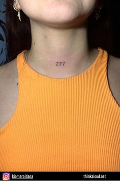 a woman with a small tattoo on her neck