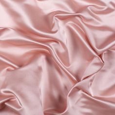 Mood's Premium Blush Silk Duchesse Satin is as regal as silk fabric gets. Its riveting understated sheen, medium weight and firm hand make for elegant special occasion wear. Available in 25+ attractive shades. 

Note: Dye lots are subject to change up to 10% in either direction. Ordering swatches is HIGHLY recommended for these products. Wedding Satin Dress, Pink Silk, Pink Satin, Rose Pink, Satin Fabric, Silk Satin, Blush Pink, Blush, Yard