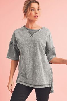 The oversized tee is a relaxed and stylish t-shirt made from a soft and breathable fabric, ensuring comfort throughout the day.With its drop shoulder design and oversized fit, this tee offers a casual and effortlessly cool look that can be paired with jeans, shorts, or leggings for a laid-back style.The tee is suitable for various occasions, including casual outings, lounging at home, or even as a comfortable workout top, providing both style and functionality.Fabric Contents: Product Weight: 0. Graphic Tank Tops, Graphic Apparel, Floral Pants, Loungewear Set, Home T Shirts, Edgy Look, T Shirt Oversized, Shoulder Design, Pant Shirt