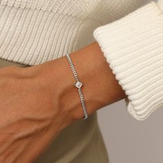 Looking for a little something extra special? Our silver bracelet for women with crystal is a perfect choice! This shining bracelet features a delicate square crystal, making it a must-have for any jewelry collection. Whether you're looking for a shining piece to wear to a special event or a delicate crystal bracelet to add to your everyday look, we have you covered. The women's  bracelet is made of sterling silver and the crystal is securely set in place. Silver Bracelet Chain, Crystal Making, Silver Bracelet For Women, Square Crystal, Silver Bracelets For Women, Bracelet Chain, Crystal Chain, Bracelet Sterling Silver, White Crystal