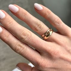 This ring is inspired by string lights. It's meant to be stacked between two other rings so that it looks like the diamonds are floating in the space between. The ring has a super fine piece of metal connecting the 5 diamonds across the top and a solid, rounded band on the bottom for comfortable wear. Rose Gold Stackable Open Ring With Single Diamond, Rose Gold Open Ring Stackable Rings With Single Diamond, Rose Gold Promise Ring With Single Diamond, Promise Ring In Rose Gold With Single Diamond, Timeless Stackable Wide Band Ring For Anniversary, Diamond Wide Band Ring With Tension Setting For Wedding, Wedding Wide Band Diamond Ring With Tension Setting, Fine Jewelry Stackable Open Band Rings With Single Diamond, Stackable Open Band Ring For Anniversary