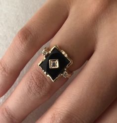 Elegant Black Diamond Ring In 14k Gold, Elegant Formal Rings With Diamond Eyes, Elegant Gold Diamond Ring With Black Diamonds, Formal Black Jewelry With Diamond Accents, Classic Black Diamond Ring Gift, Black Diamond Enamel Ring For Anniversary, Classic Black Diamond Ring As A Gift, Diamond Enamel Ring With Black Enamel, Classic Black Diamond Ring For Gift